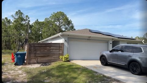Single-story Brevard County home with attached garage and new gutters